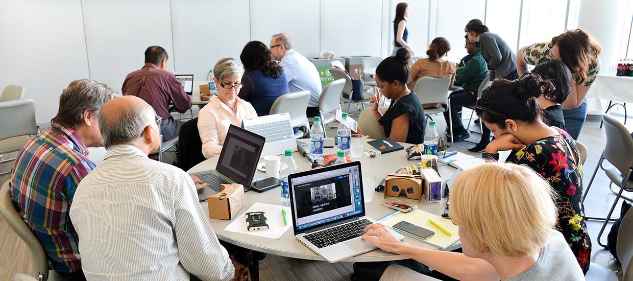 People using VR technology on computers